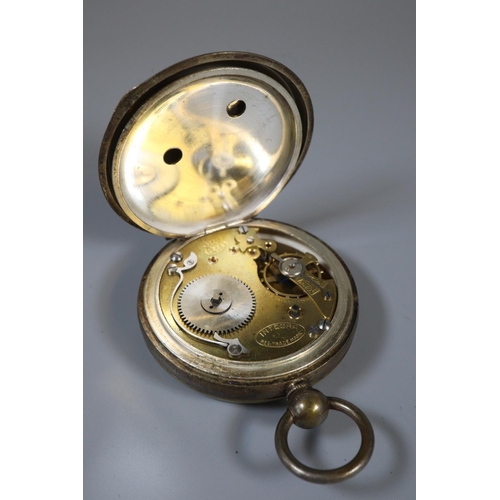 311 - Silver plated open faced pocket watch, Railway Timekeeper, Brown & Co. Special lever, together with ... 