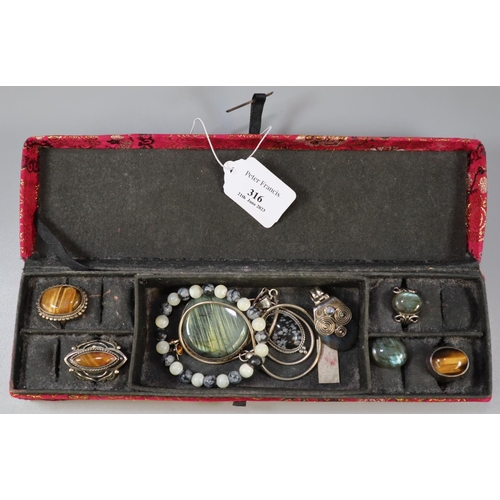 316 - Oriental design fabric jewellery box comprising assorted silver jewellery: Tiger's Eye dress rings, ... 