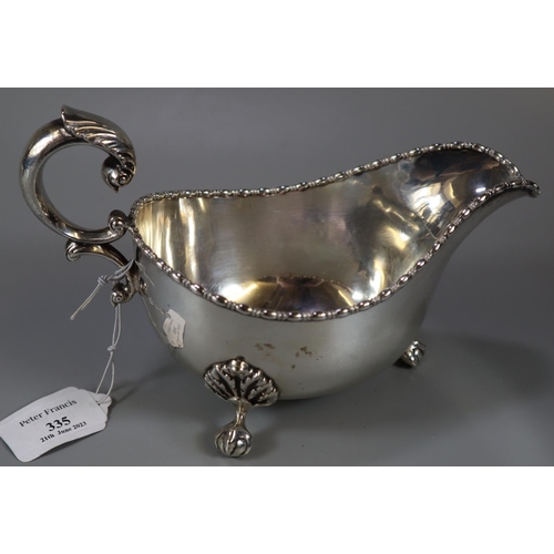 335 - American Sterling silver classical design sauce/gravy boat, marked Howard & Co 1902 New York.  9.8 t... 