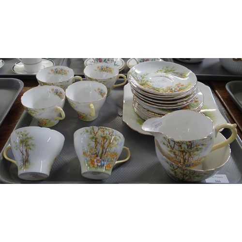 366 - Tray of Shelley English bone china 'Daffodil Time' 13370 teaware to include: six cups and saucers, s... 