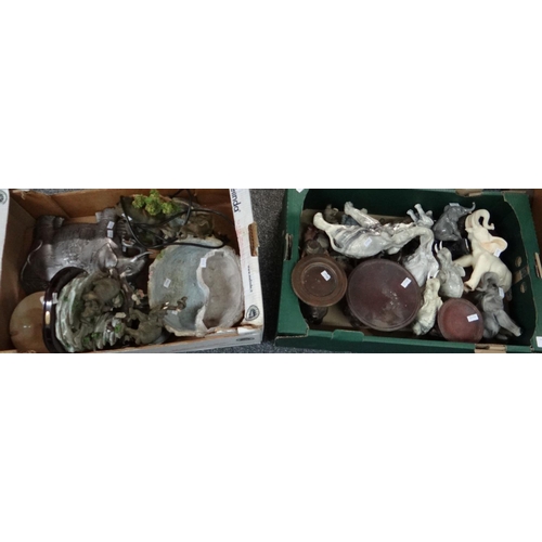 392 - Two boxes of mostly elephant figures to include: carved wooden elephant candle holders, John Beswick... 