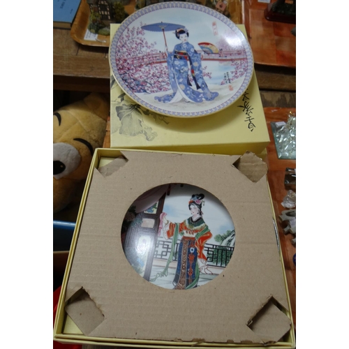 423 - Ten boxed 1980's Imperial Jingdezhen collectors plates with COA decorated with Chinese scenes and on... 