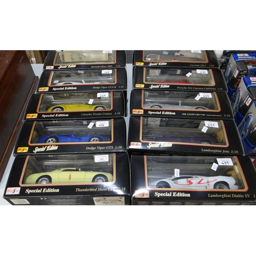 439 - Ten Maisto 1:18 scale diecast model sportscars in original boxes to include: Mercedes Benz 300S, Thu... 