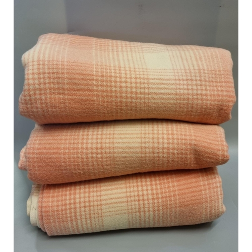 455 - Three similar vintage woollen pink and cream check blankets. (3)
(B.P. 21% + VAT)