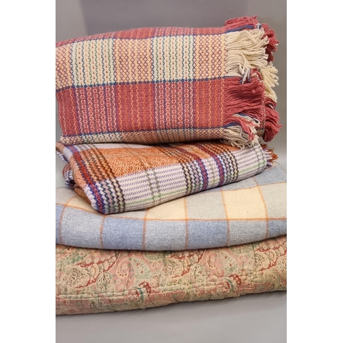 457 - Three vintage woollen check blankets or carthen; two multicolour and one cream and blue. Together wi... 