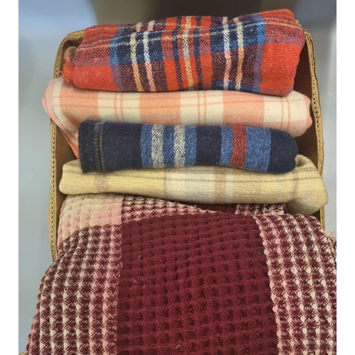 473 - Box containing various vintage blankets and throws, mostly woollen to include: a honeycomb check des... 