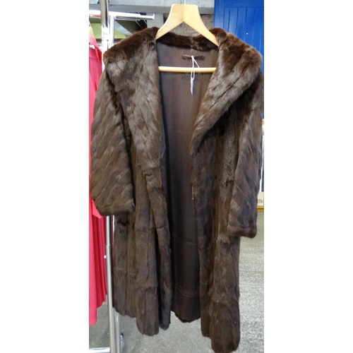 478 - National Fur Company dark brown knee length vintage fur coat. 
(B.P. 21% + VAT)