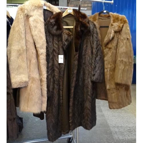 479 - Collection of three vintage fur coats and jackets to include: one brown, one light brown and a dark ... 