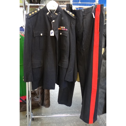 483 - Military uniform, dark blue dress coat and trousers, Reme Captain.   (B.P. 21% + VAT)