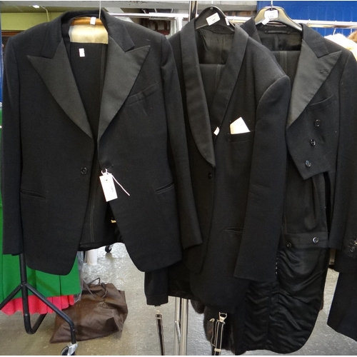 485 - Three vintage black men's suits; one 30's three piece suit, a 1930's tailcoat and trousers and a Hec... 