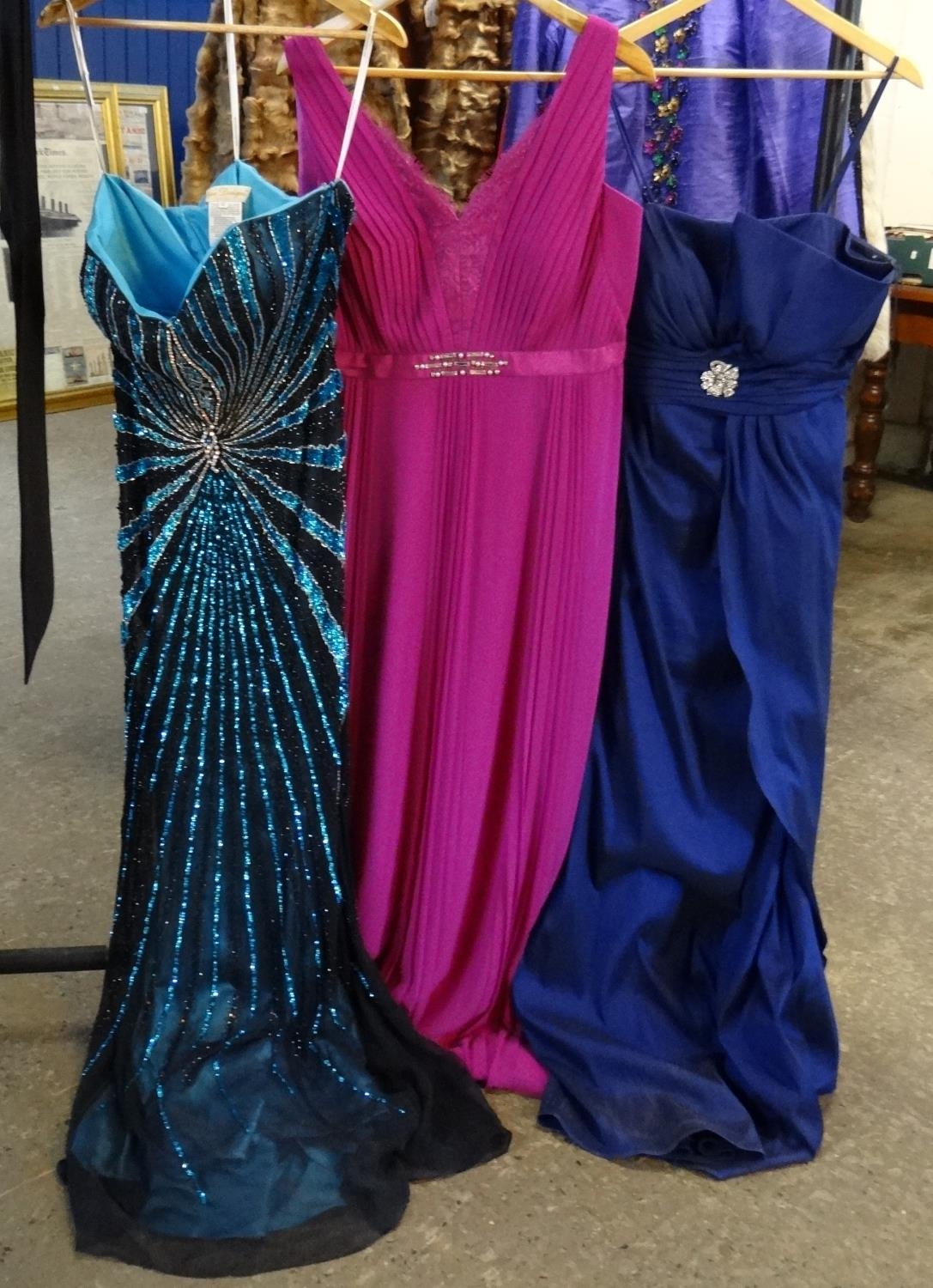 Three modern ladies evening dresses to include NW Nightway size 12 blue dress with spaghetti straps