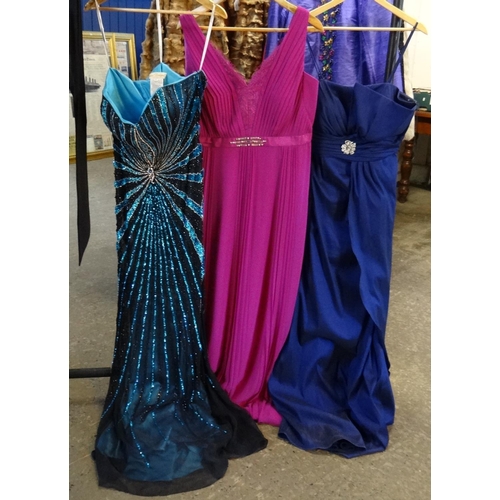 489 - Three modern ladies evening dresses to include: NW Nightway size 12 blue dress with spaghetti straps... 