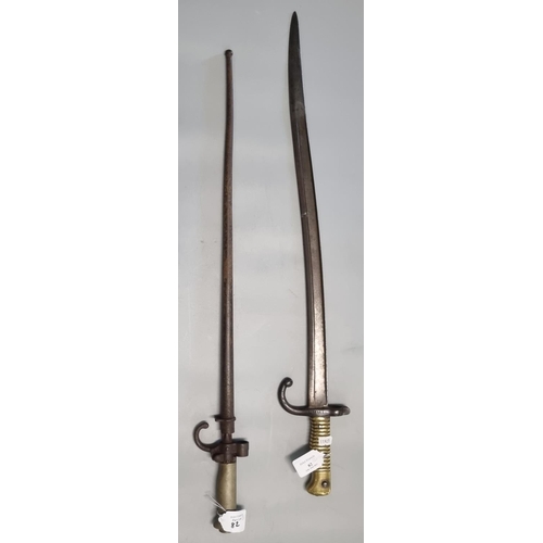 82 - Two 19th century French bayonets, a Lebel with cruciform blade and circular tapering metal scabbard ... 