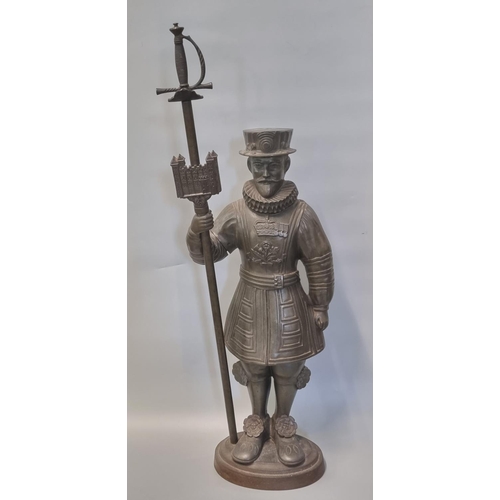 99 - Early 20th century cast iron companion stand in the form of a Beefeater.  Impressed marks 'Made in E... 