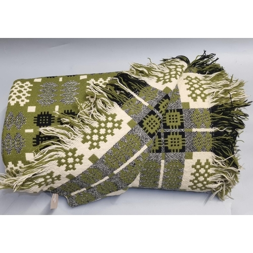 119 - Vintage Welsh tapestry green ground blanket with fringed edge and traditional Caernarfon design. 
(B... 