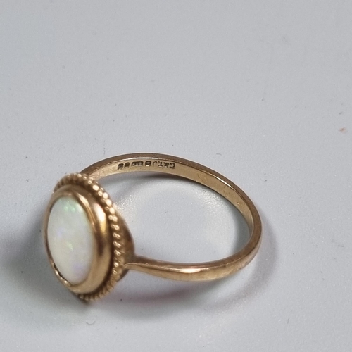 225 - 9ct gold opal dress ring.  2.4g approx.  Size N.  (B.P. 21% + VAT)