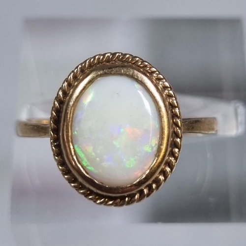 225 - 9ct gold opal dress ring.  2.4g approx.  Size N.  (B.P. 21% + VAT)