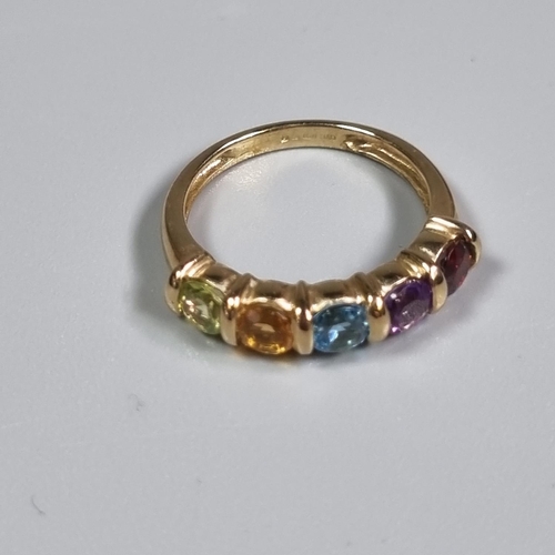 228 - 9ct gold multi coloured five stone dress ring.  2.2g approx.  Size J1/2.  (B.P. 21% + VAT)