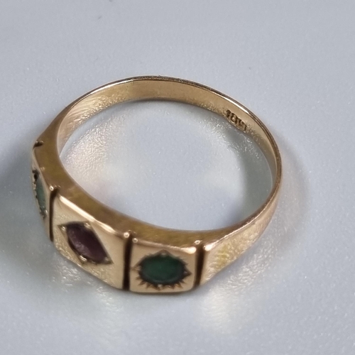 229 - 18ct gold three stone green and red ring.  3.6g approx.  Size L.  (B.P. 21% + VAT)