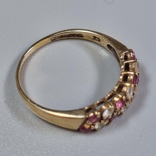 232 - 9ct gold Cubic Zirconia and red stone dress ring.  1.7g approx.  Size N.  (B.P. 21% + VAT)