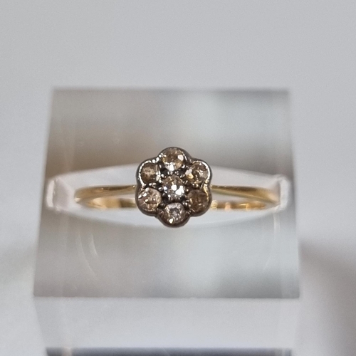 233 - 18ct gold and diamond flowerhead cluster ring.  1.7g approx.  Size L.  (B.P. 21% + VAT)