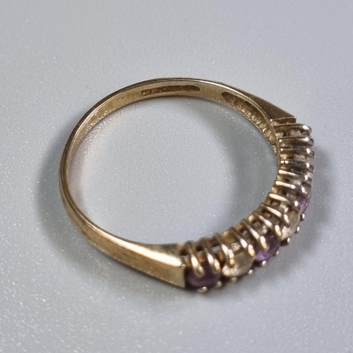 240 - 9ct gold purple and white stone dress ring.  1.7g approx.  Size M.  (B.P. 21% + VAT)