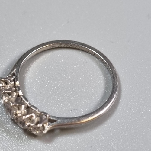 252 - White metal, probably gold, five stone diamond ring, tests as diamonds.  2.6g approx.  Size M.  (B.P... 