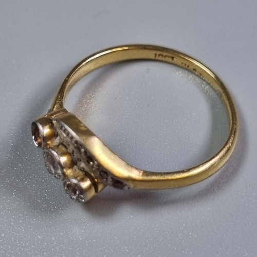 253 - 18ct gold and platinum twist shank diamond ring. One diamond missing.  2.7g approx.  Size L1/2.  (B.... 