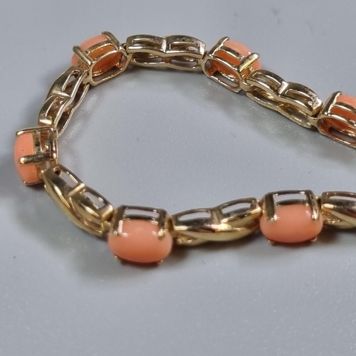 259 - 9ct gold and pink stone bracelet.  7.4g approx.  (B.P. 21% + VAT)