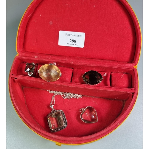 288 - Jewellery box of assorted silver, smokey and other quartz dress rings, heart shaped pendant and anot... 