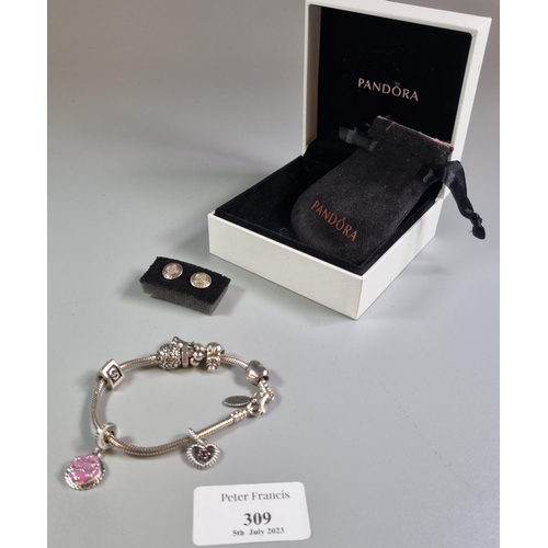 309 - Pandora silver charm bracelet and eight Pandora silver charms together with a Pandora 14ct gold and ... 