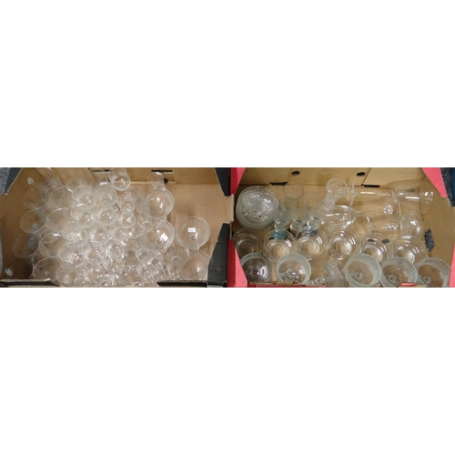 345 - Two boxes of glassware to include: various drinking vessels; liqueur glasses, shot glasses, champagn... 