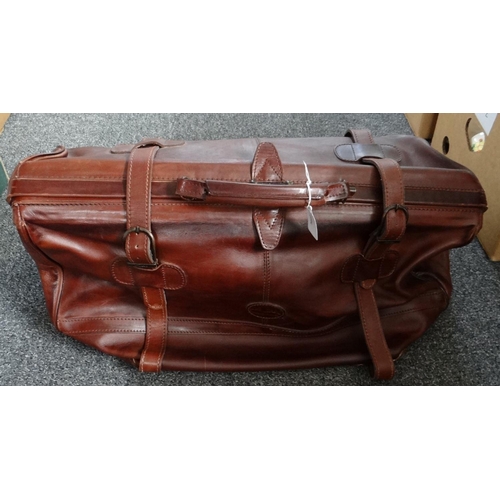 348 - Large Sencan leather holdall bag. 
(B.P. 21% + VAT)