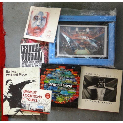 397 - Box of Art books and associated items to include: 'Banksy Locations and Tours' book, signed Bob Reev... 