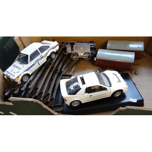 487 - Two Sunstar diecast model vehicles to include: Ford Escort together with probably Hornby tinplate cl... 