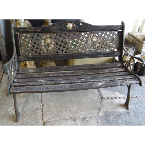 497 - Modern cast metal and teak slatted garden bench.  (B.P. 21% + VAT)