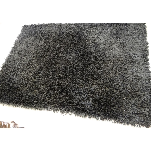 515 - Three modern furnishing rugs, one black ground shag pile design.  (3)  (B.P. 21% + VAT)