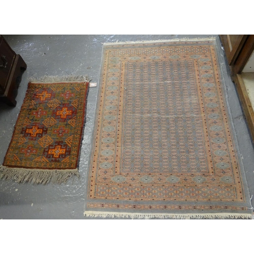 516 - Middle Eastern design rug/runner on a pale blue ground with geometric foliate designs together with ... 