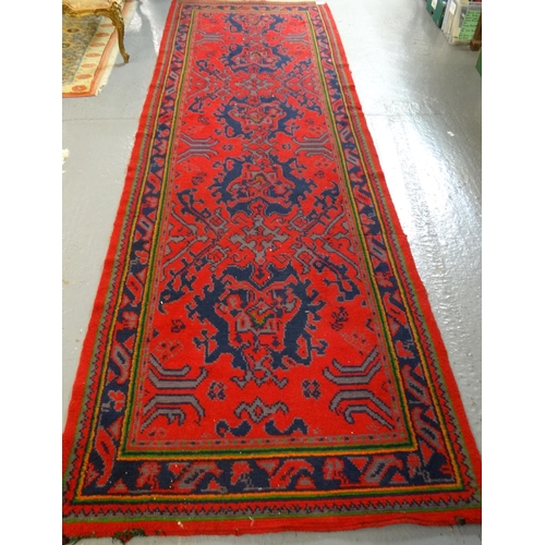 520 - Vintage red ground Iranian runner with geometric and foliate decoration.  (B.P. 21% + VAT)