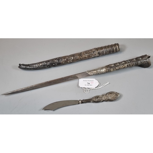 76 - White metal relief cast and chased Khandjar dagger of Middle Eastern origins, with steel blade. Over... 