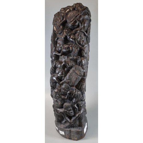 94 - Tribal hardwood carved sculpture of repeating tribal figures, appearing at work. 
(B.P. 21% + VAT)