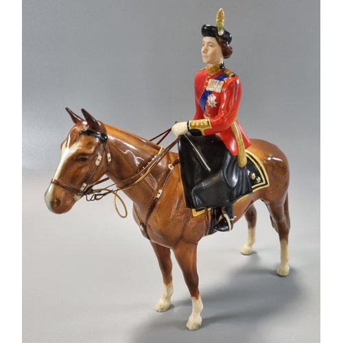 142 - Beswick model of H.M. Queen Elizabeth II mounted on 'Imperial' Trouping The Colour.  (B.P. 21% + VAT... 