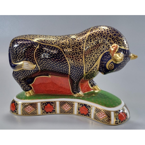 147 - Royal Crown Derby English fine bone china Imari design paperweight of a bull with gold stopper in or... 