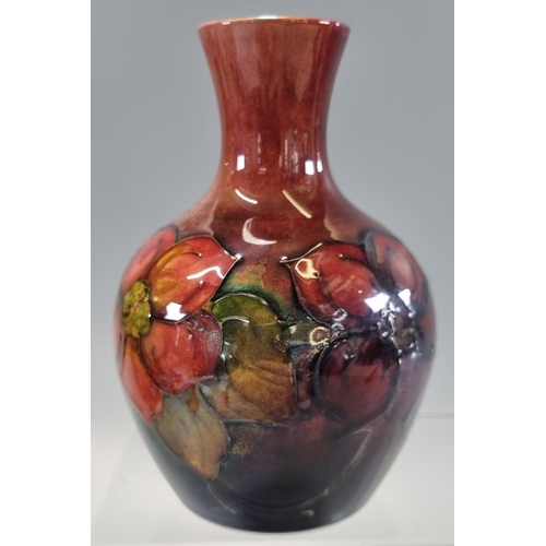 154 - Moorcroft pottery tube lined 'Flambe' Orchid vase of baluster form, impressed marks to the underside... 