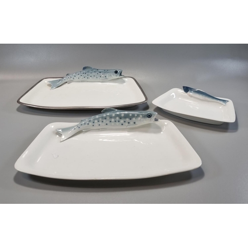 164 - Two similar German porcelain fish platters, one with white metal rim, both decorated with relief Tro... 