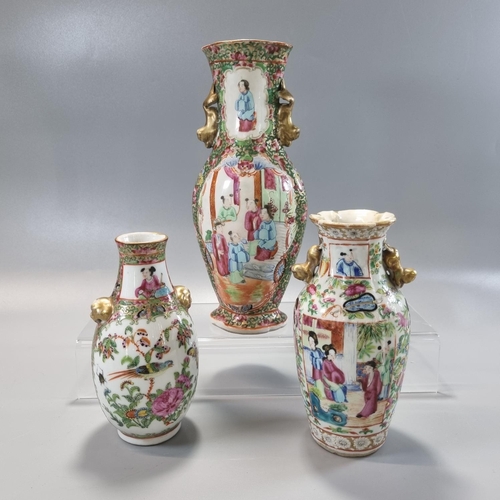 165 - Group of three Chinese porcelain Canton Famille Rose vases, ranging in height from 14.5cm to 23.5cm,... 