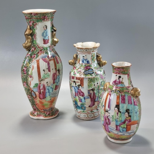 165 - Group of three Chinese porcelain Canton Famille Rose vases, ranging in height from 14.5cm to 23.5cm,... 