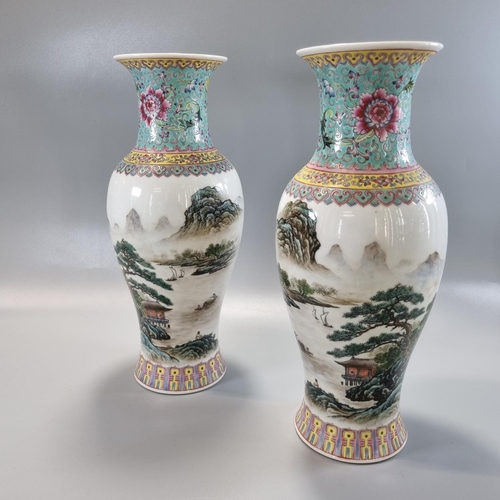 166 - Pair of Chinese mirror matched porcelain Famille Rose baluster 'Landscape Vases', each depicting a p... 