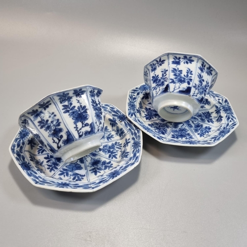 169 - Pair of Chinese blue and white octagonal tea bowls and saucers, decorated to the front and reverse w... 