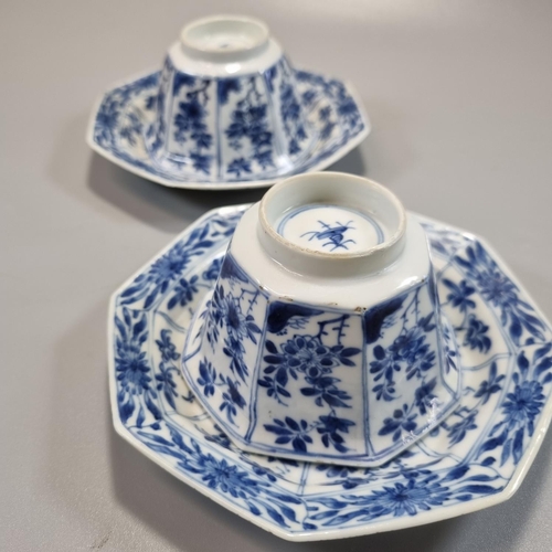 169 - Pair of Chinese blue and white octagonal tea bowls and saucers, decorated to the front and reverse w... 